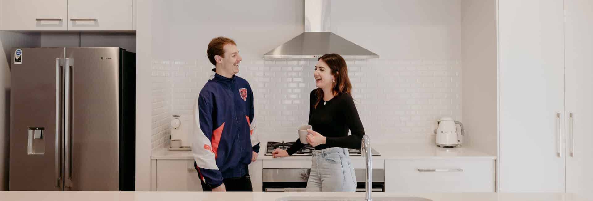 First home buyers in the kitchen of their first home